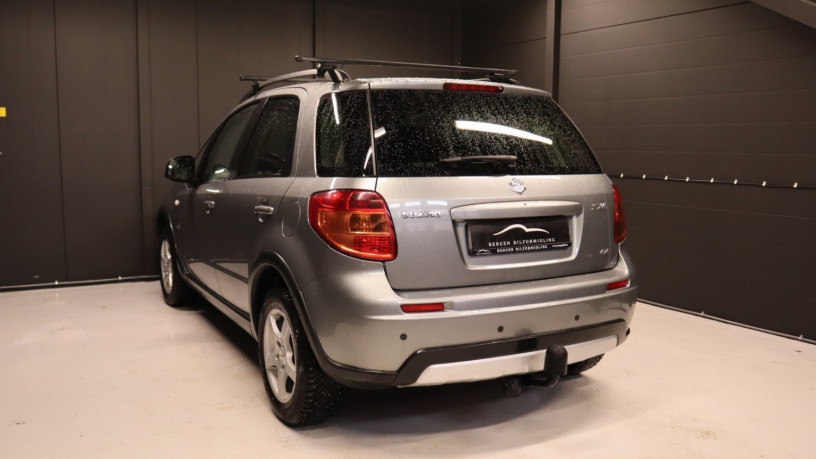 suzuki-sx4-bensin-2012-big-3